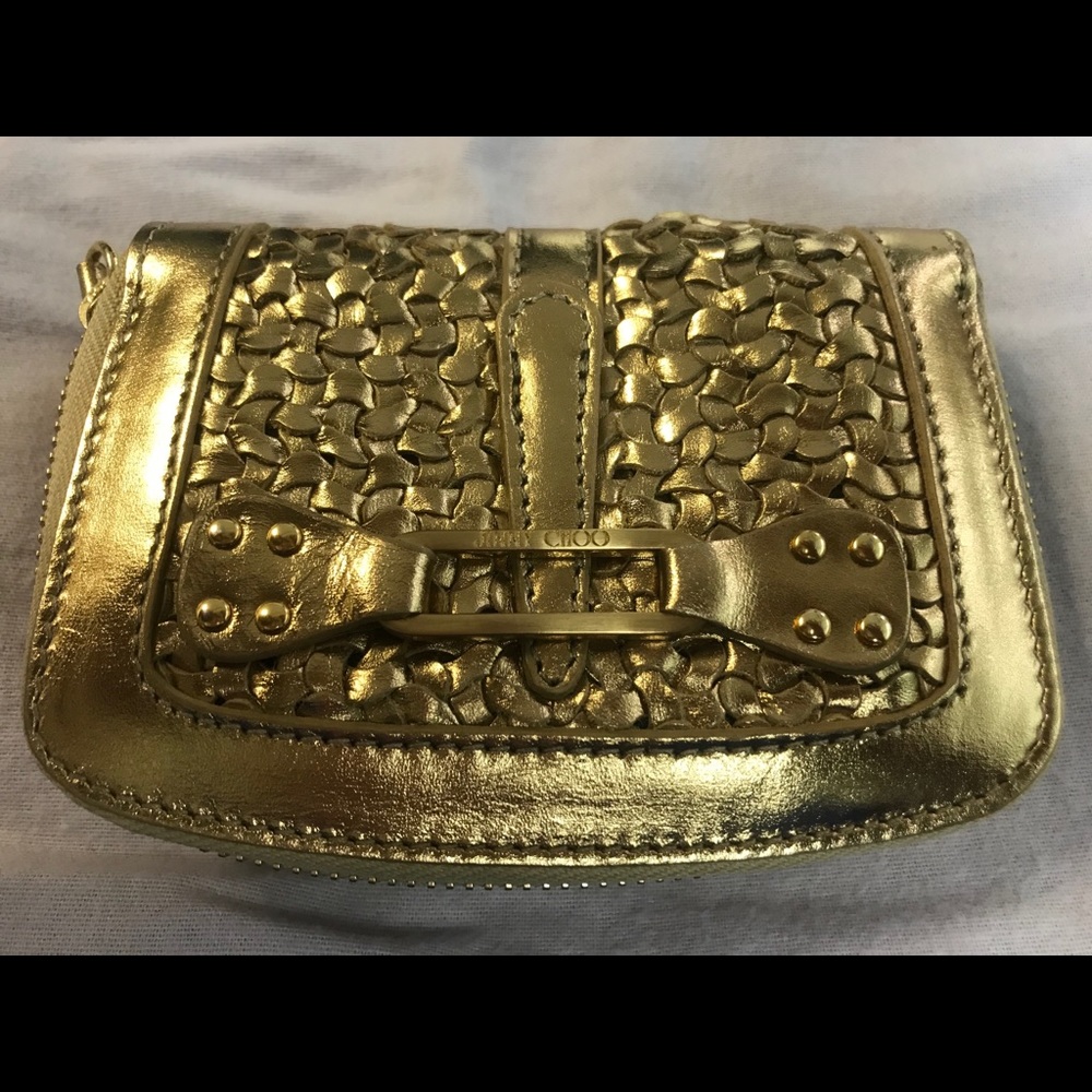 Jimmy Choo gold wallet never used with dust bag